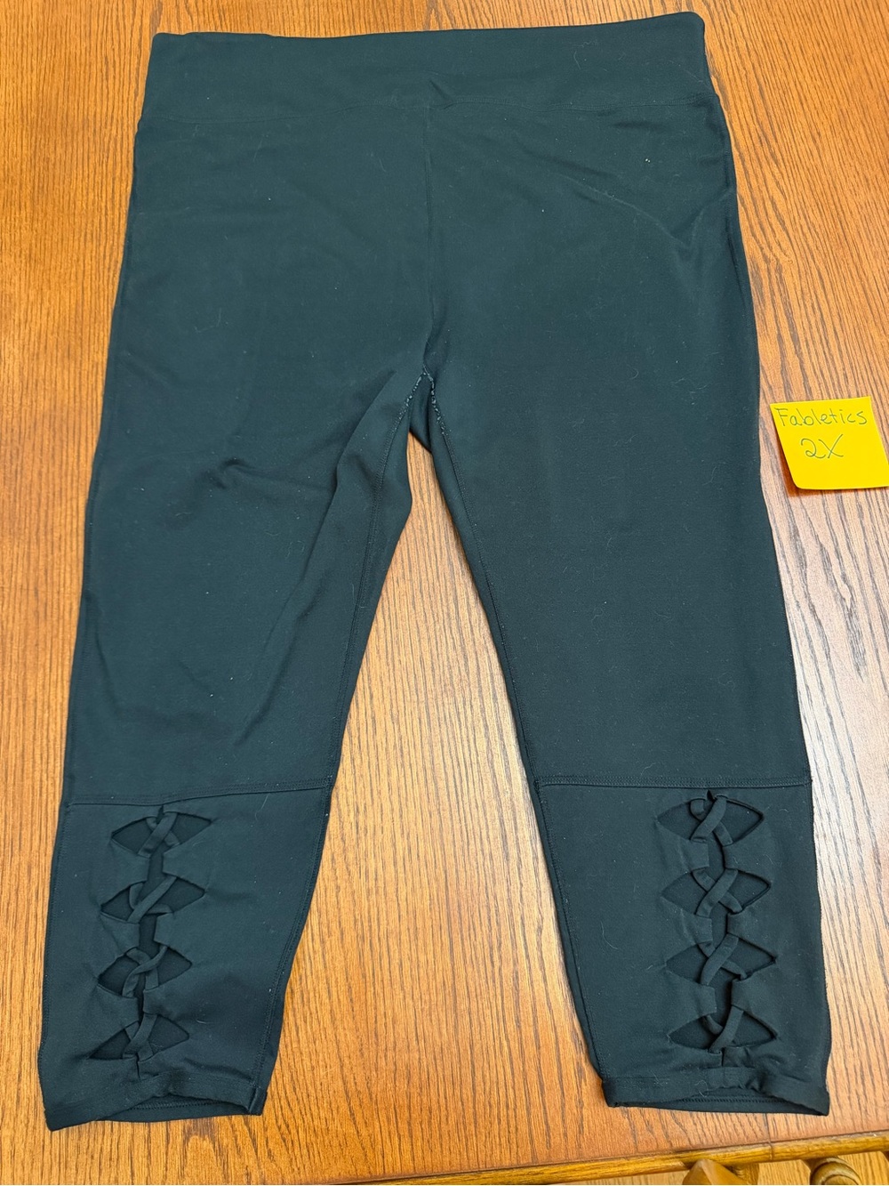 Fabletics Black Capri Leggings with Lattice Detail
